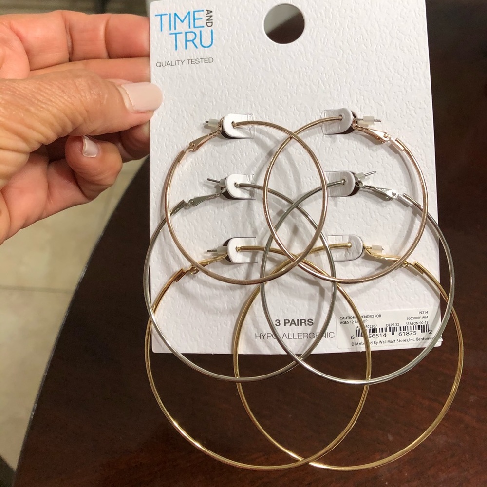 Time And Tru, set of three pairs of earrings